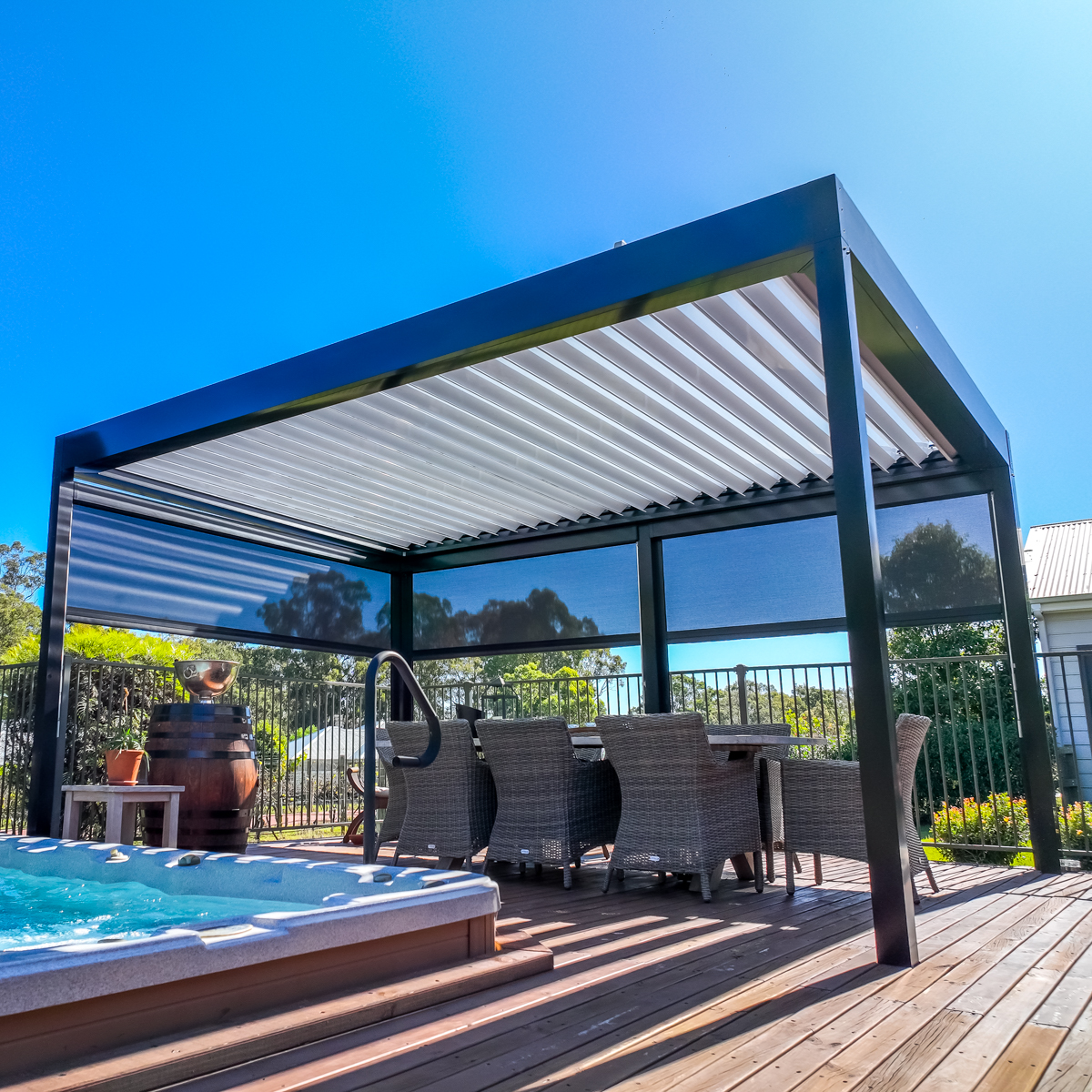 Stratco awning with automatic louvred roof and retractable blinds